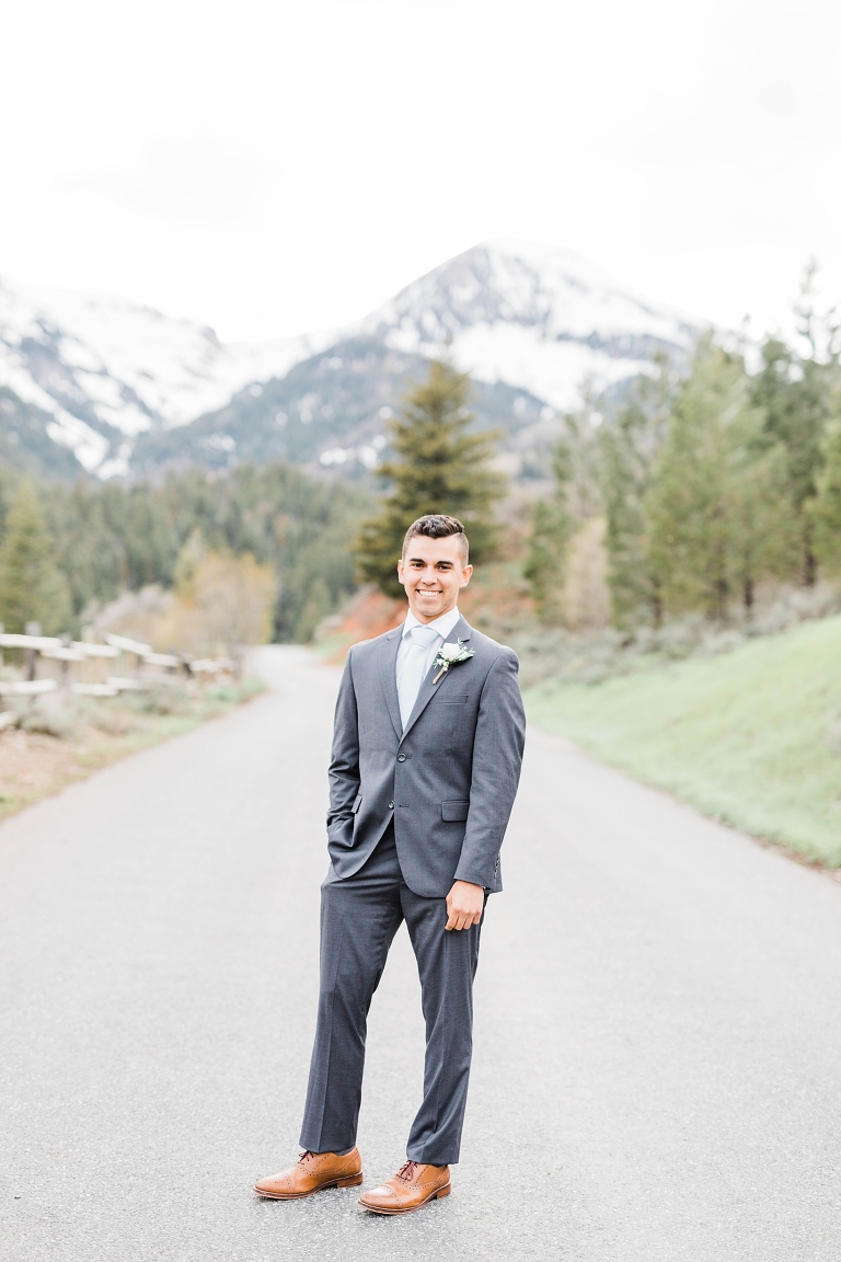 Utah Mountain Wedding Photography at Tibble Fork Reservoir, groom in gray suit and sage green tie