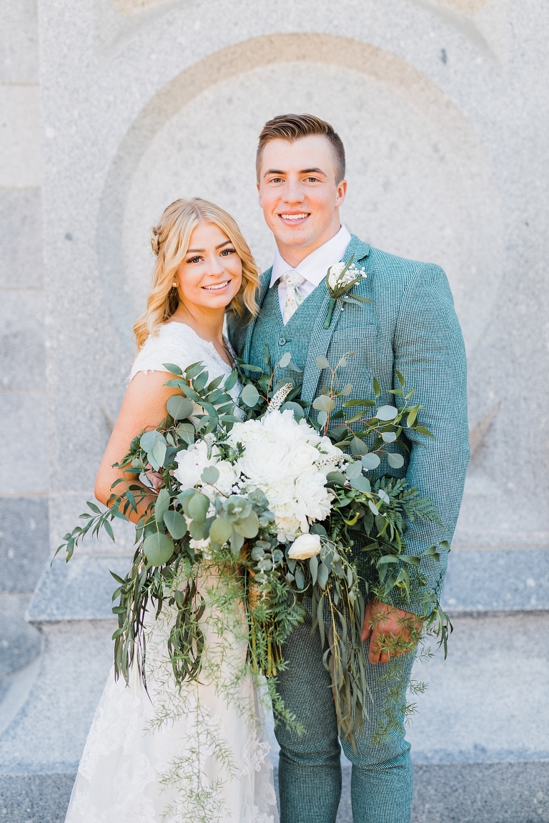 Utah LDS Wedding Photography at the Salt Lake Temple, Spring Wedding with white wedding flowers bouquet greenery