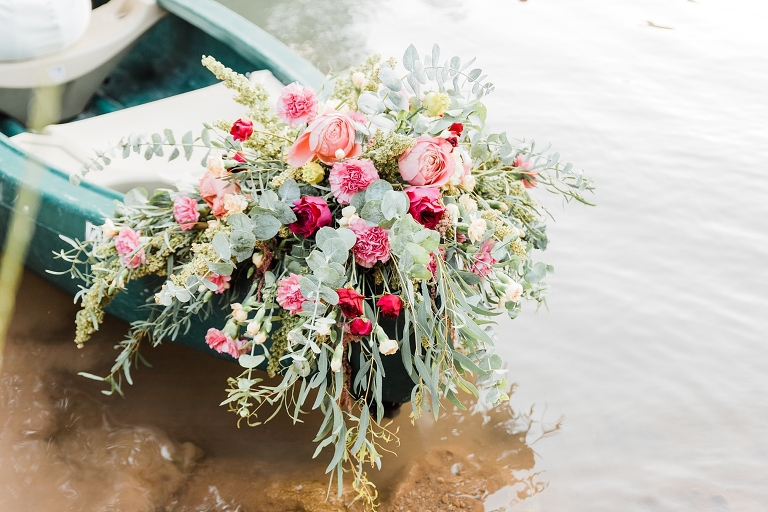 Tibble Fork Reservoir Couple in a Canoe, Utah Wedding Photography, bright pink flowers greenery floral design
