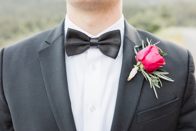Tibble Fork Reservoir Couple in a Canoe, Utah Wedding Photography, groom in classic black tuxedo and black bow tie pink rose boutonniere