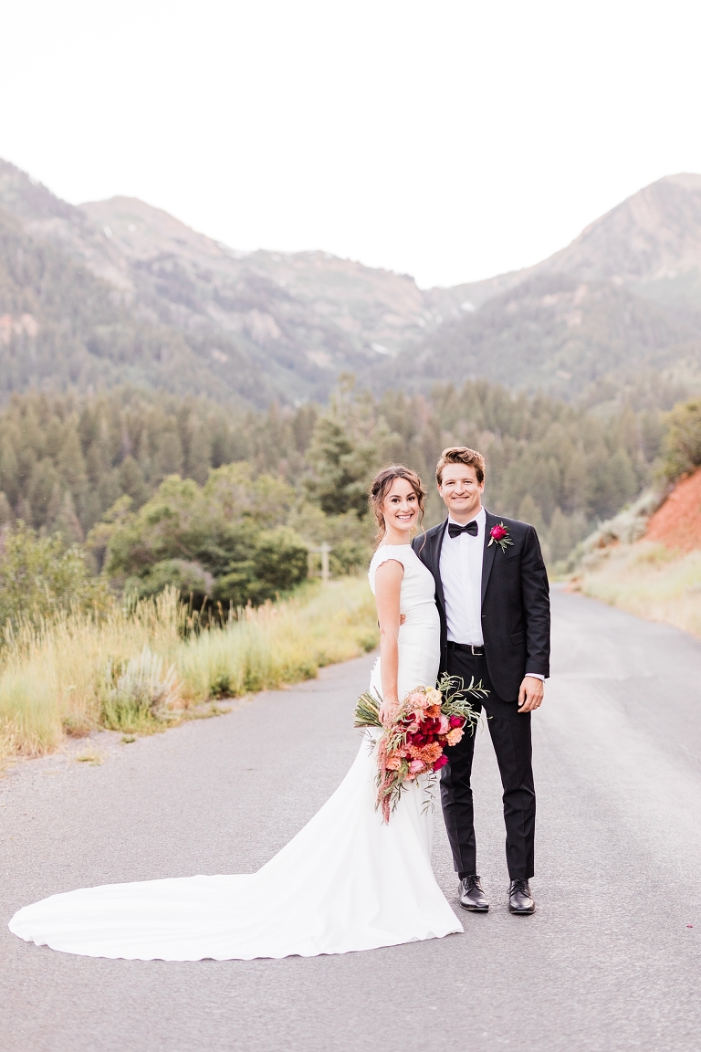 Tibble Fork Reservoir Couple in a Canoe, Utah Wedding Photography, bride and groom in mountains