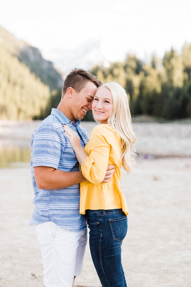 engagement photos at Tibble Fork Reservoir Utah engagement photography, yellow shirt summer outfits, what to wear for engagement photos, road trip questions for couples