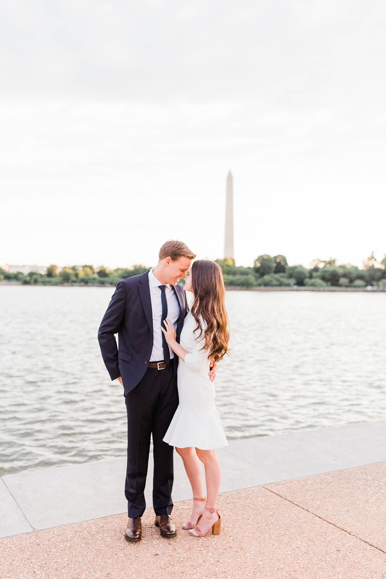 engagement photos at Washington Monument Washington D.C. engagement photography, little white dress black suit summer outfits, what to wear for engagement photos, road trip questions for couples